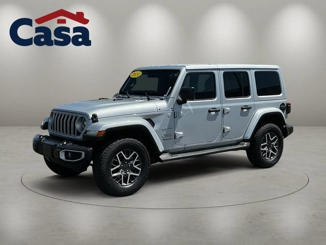 2024 Jeep Wrangler Sahara in Silver Zynith Clearcoat — front three-quarter view