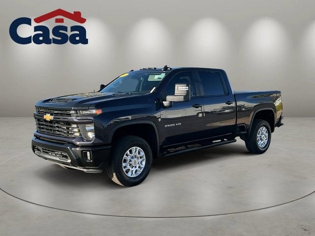 2024 Chevrolet Silverado 2500 HD Custom in Dark Ash Metallic — front three-quarter view